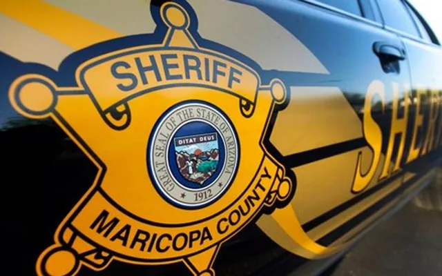 Maricopa County Sheriff badge on the door of a patrol vehicle